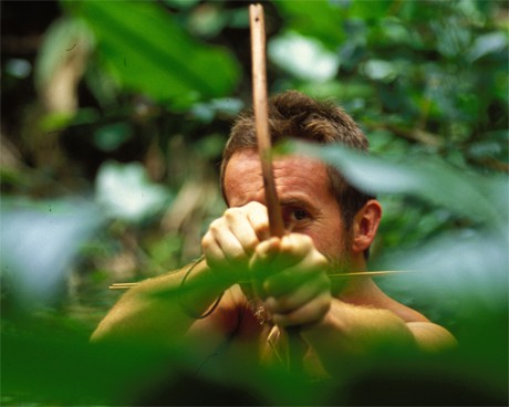 Bruce Parry in Gabon shooting an arrow. 